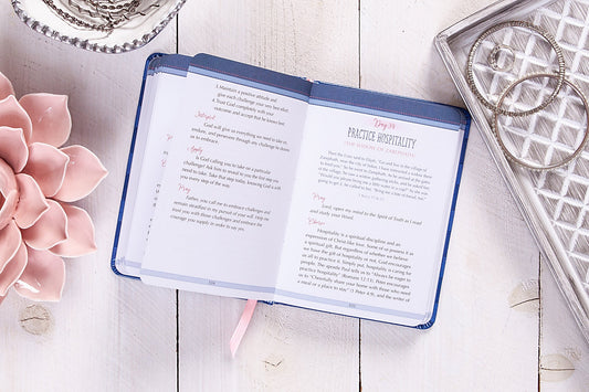 SHE IS STRONG AND COURAGEOUS: A 90-DAY DEVOTIONAL